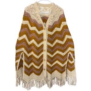 Vintage handmade women’s crochet poncho with buttons & fringe one size fits most